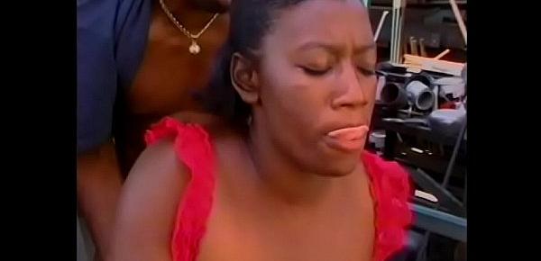  Black MILF in red dress Choclate Tie eats dick before getting fucked from behind